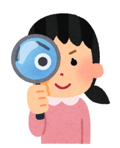 虫眼鏡を覗いている女性