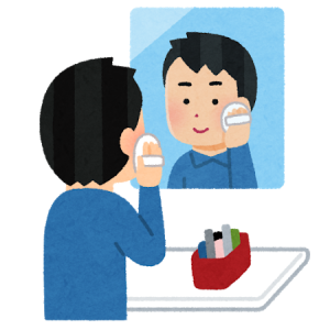 お化粧をしている男