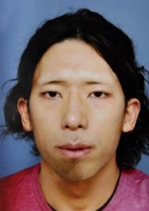 捕まった犯人の写真